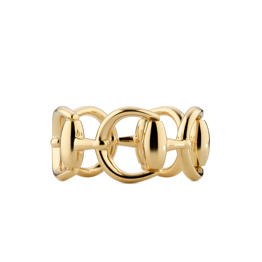 The Gucci Horsebit 18K Yellow Gold Ring by GUCCI Fine Jewellery features interlocking oval and circular links, inspired by iconic horsebit motifs, creating a modern statement piece showcased against a white background.