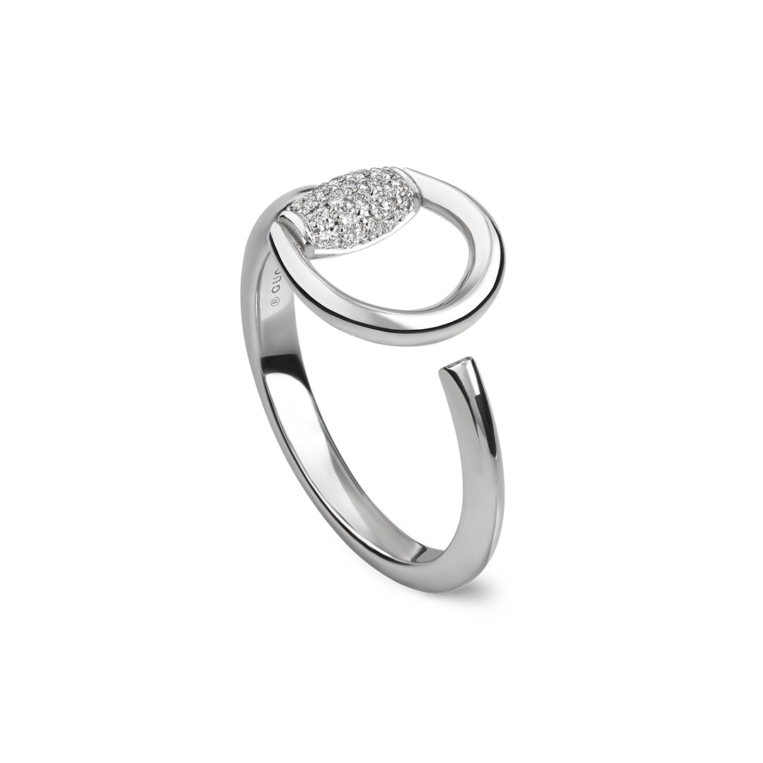 The Gucci Horsebit 18K White Gold Diamond Ring by GUCCI Fine Jewellery features a looped open band with a pavé diamond cluster on one end, shown against a white background.