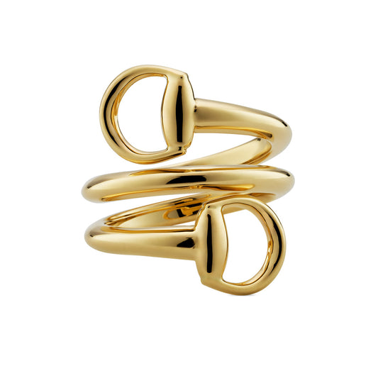 The Gucci Horsebit 18K Yellow Gold Contrarie Ring by GUCCI Fine Jewellery features a sculptural design with two overlapping bands ending in rounded, open loops and a polished, reflective finish inspired by iconic horsebit jewelry.