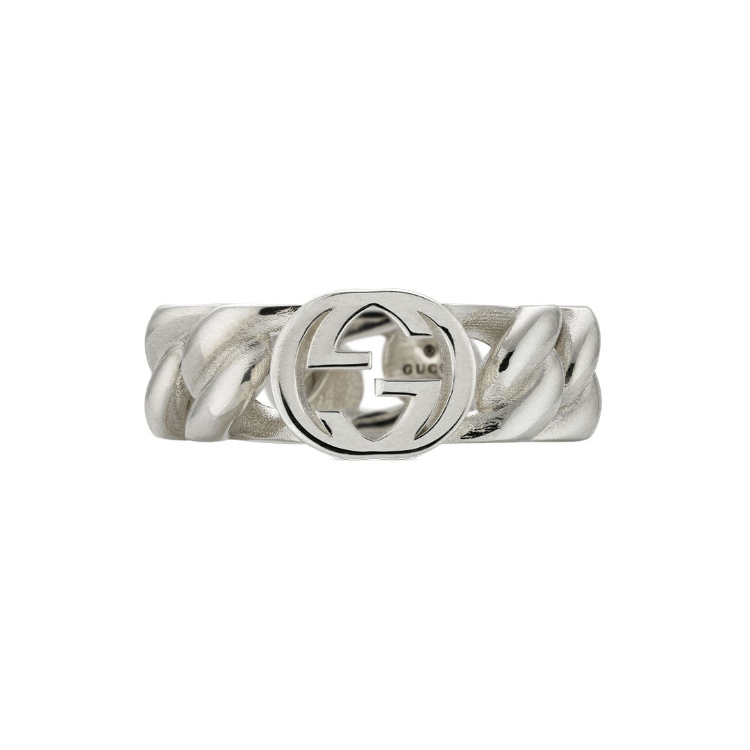 The Gucci Interlocking G Sterling Silver 7mm Ring by GUCCI Fine Jewellery features a twisted band and the signature interlocking G logo at the center.