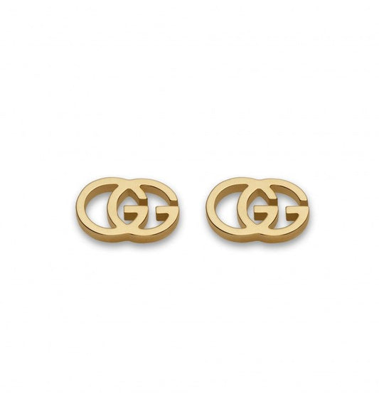 The Gucci Interlocking G 18K Yellow Gold Stud Earrings by GUCCI Fine Jewellery feature two gold interlocking "G" logos set against a white background.