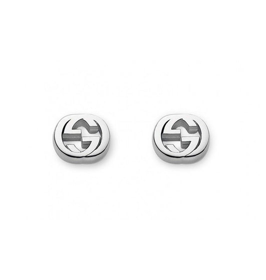 A pair of sterling silver earrings featuring an interlocking G design by GUCCI Fine Jewellery.