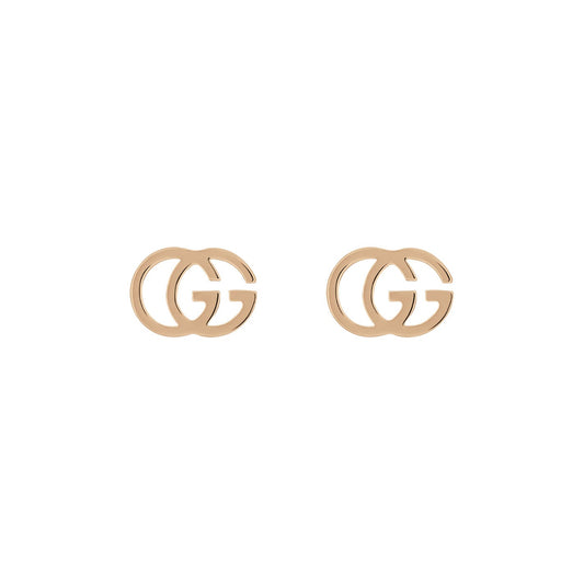 Introducing the Gucci GG Running 18K Rose Gold Stud Earrings from GUCCI Fine Jewellery, these elegant earrings are crafted in 18k rose gold with a shiny finish. Certified by the Responsible Jewellery Council, their timeless design is elegantly showcased against a plain white background.