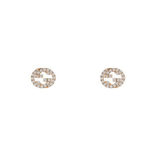 Gucci Interlocking G 18K rose gold stud earrings by GUCCI Fine Jewellery, featuring a geometric design encrusted with numerous small, sparkling diamonds, set against a plain white background.
