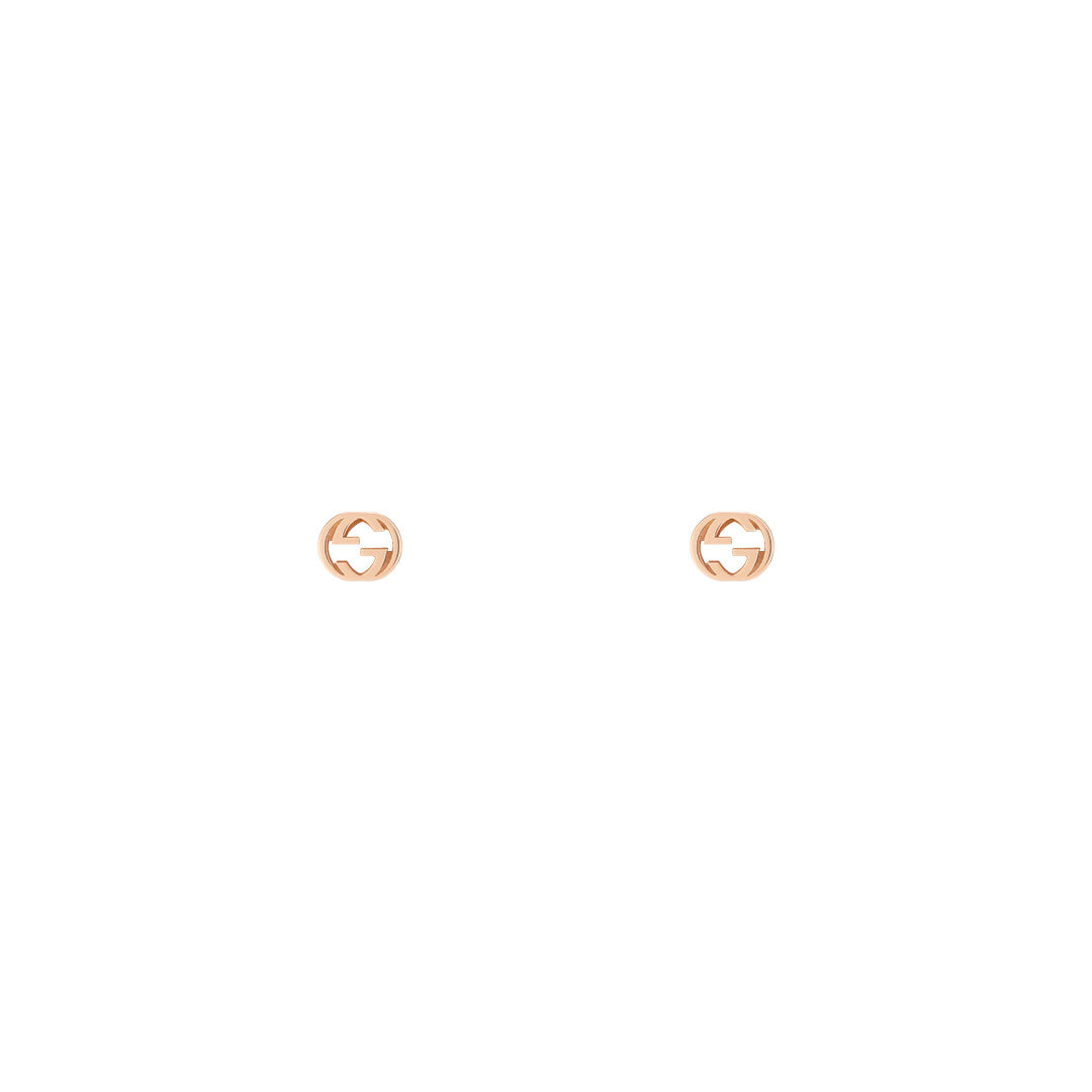 GUCCI Fine Jewellery's Interlocking G 18K Rose Gold Stud Earrings, crafted in Italy with a cut-out logo design, are shown on a plain white background.