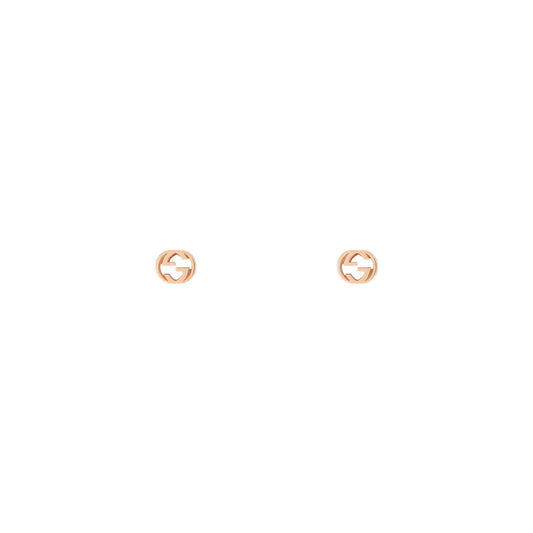 GUCCI Fine Jewellery's Interlocking G 18K Rose Gold Stud Earrings, crafted in Italy with a cut-out logo design, are shown on a plain white background.