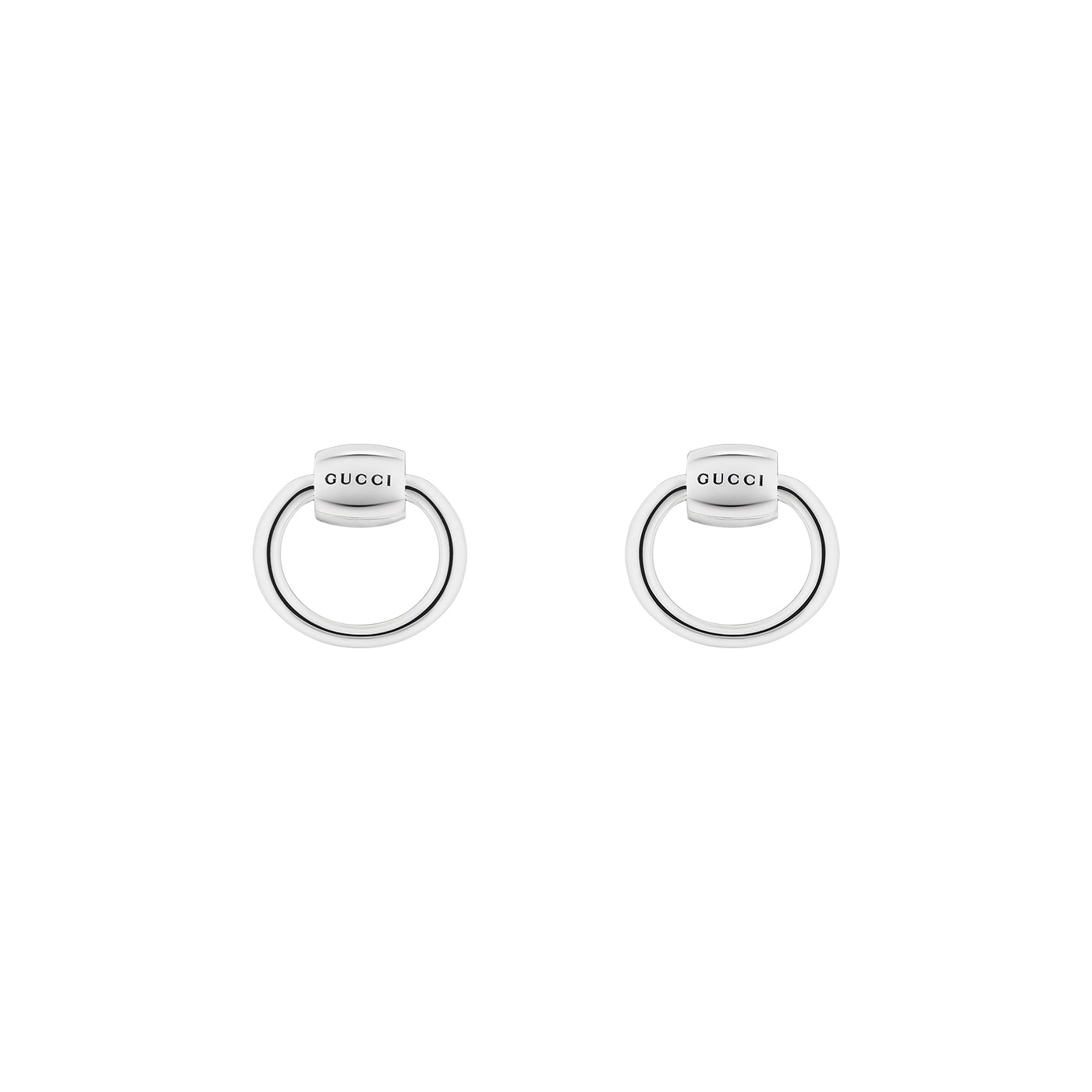 Introducing the Gucci Horsebit Sterling Silver Small Hoop Earrings by GUCCI Fine Jewellery, these elegant earrings showcase the brand's name tastefully engraved on top. The minimalist design features a small bar connecting to a larger hoop, subtly embodying an equestrian-inspired motif. Set against a simple white background, these earrings exude timeless sophistication.