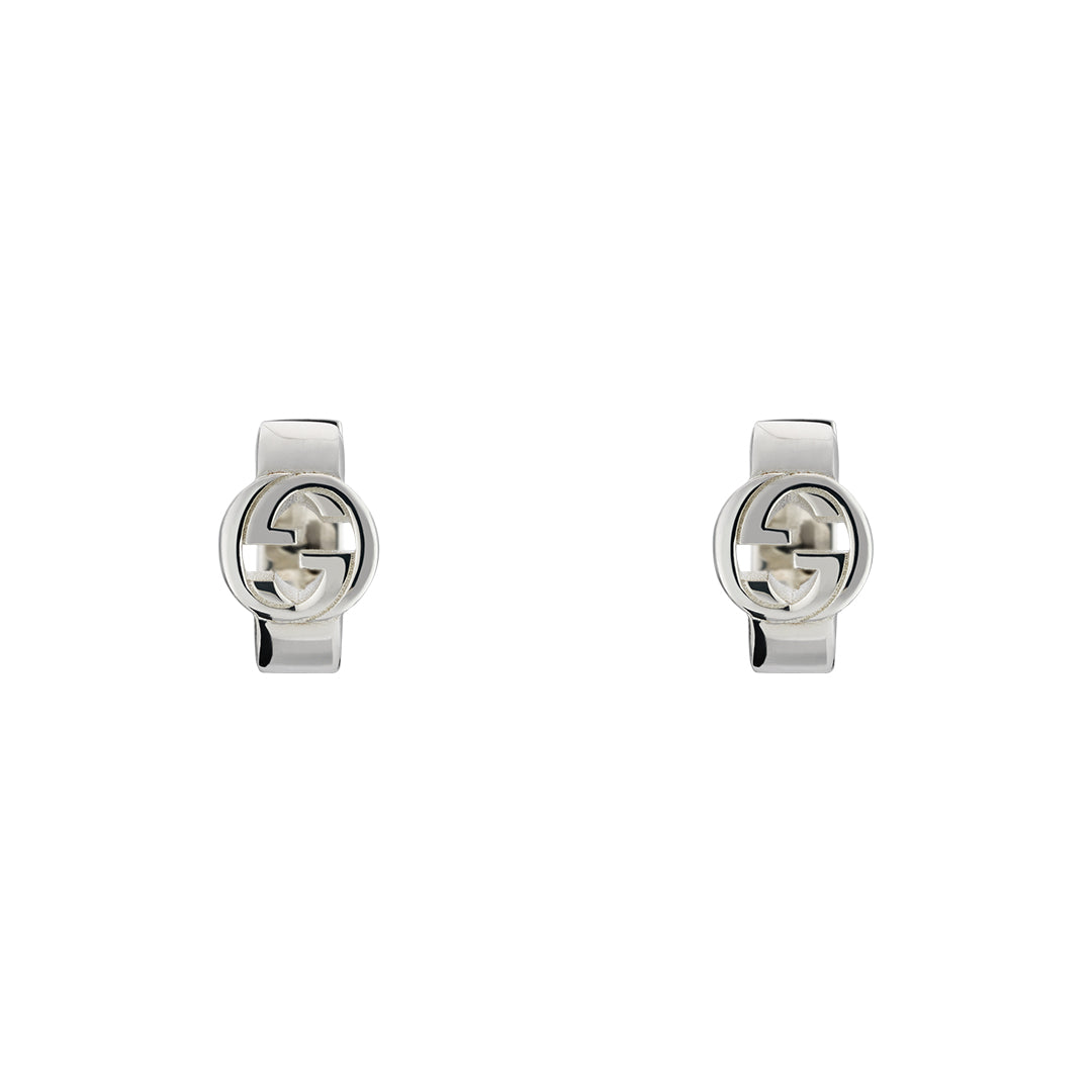 The Gucci Interlocking G Sterling Silver Wide Hoop Earrings by GUCCI Fine Jewellery, crafted from 925 sterling silver with interlocking G logo design, measure 13.2mm and are shown on a plain white background.
