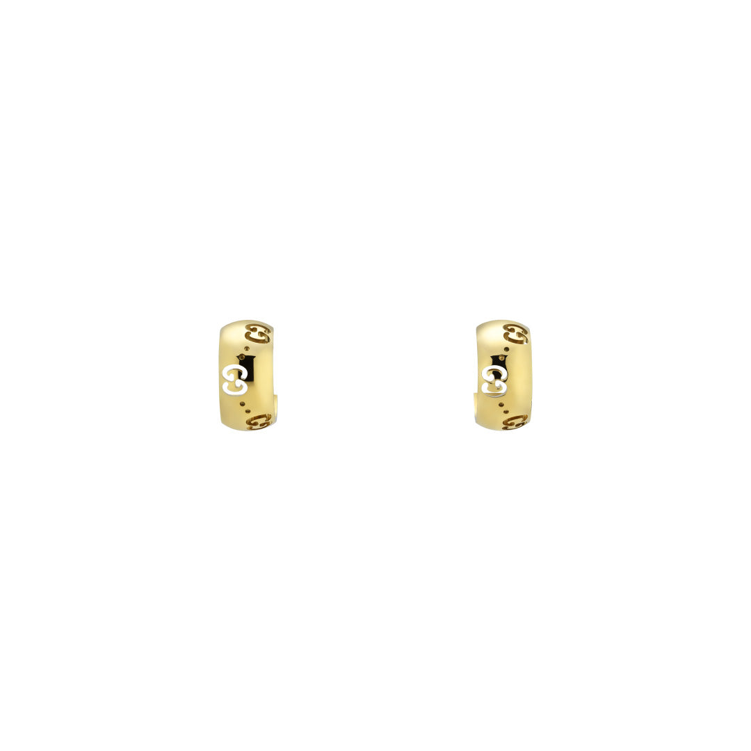The Gucci Icon GG 18K Yellow Gold Hoop Earrings from GUCCI Fine Jewellery exhibit elegantly crafted small cut-out Mickey Mouse designs evenly spaced around the hoops. These polished earrings, crafted by a Responsible Jewelry Council member, are presented against a plain white background for an exquisite display.