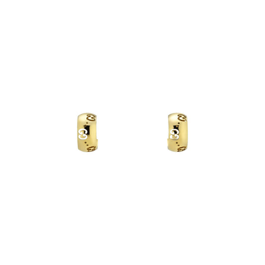 The Gucci Icon GG 18K Yellow Gold Hoop Earrings from GUCCI Fine Jewellery exhibit elegantly crafted small cut-out Mickey Mouse designs evenly spaced around the hoops. These polished earrings, crafted by a Responsible Jewelry Council member, are presented against a plain white background for an exquisite display.