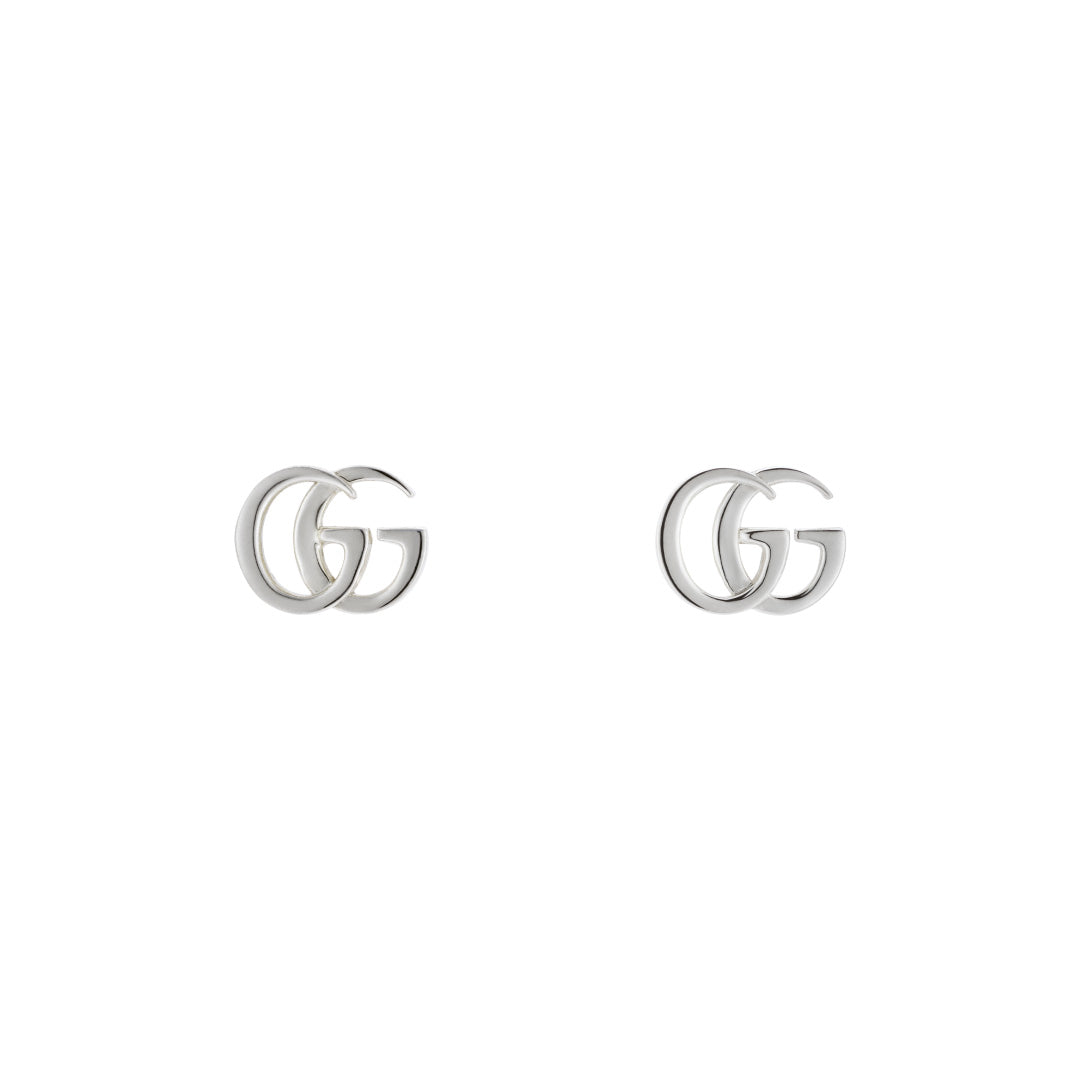 GUCCI Fine Jewellery's Gucci GG Mormont Sterling Silver Stud Earrings are elegantly showcased on a white background.