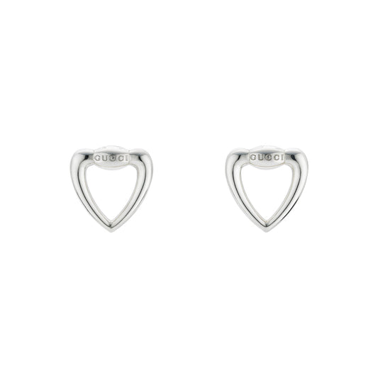 These Gucci Sterling Silver Heart Stud Earrings from GUCCI Fine Jewellery showcase a cut-out heart design with the brand name elegantly engraved, set against a pristine white background.