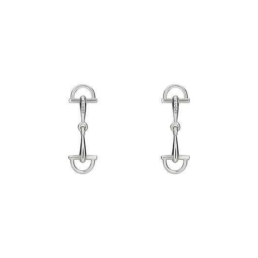Gucci Staffa Sterling Silver Stud Earrings by GUCCI Fine Jewellery, featuring horse bit-inspired geometric shapes and polished surfaces, set against a white background. Inspired by classic Gucci silver jewelry.