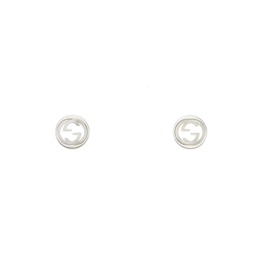 A pair of Gucci Interlocking G Sterling Silver Stud Earrings by GUCCI Fine Jewellery, featuring a Guilloché cut-out double G logo design, displayed on a white background.