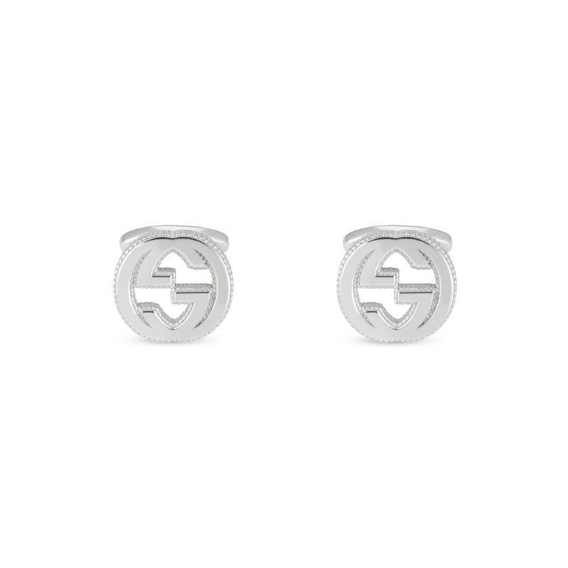 GUCCI Fine Jewellery presents the Gucci Interlocking G Cufflinks, crafted from sterling silver and showcasing a circular design with their iconic Interlocking G pattern.