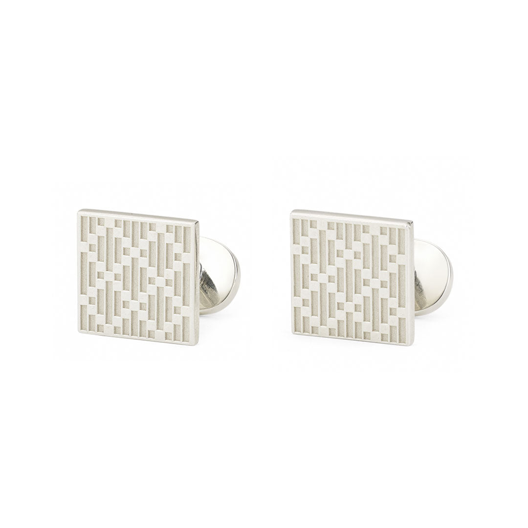 A pair of Gucci Diamante Sterling Silver Cufflinks from GUCCI Gift and Accessories, crafted from 925 sterling silver with a square shape and a geometric grid pattern inspired by the iconic Gucci Diamante motif, showcased against a white background.