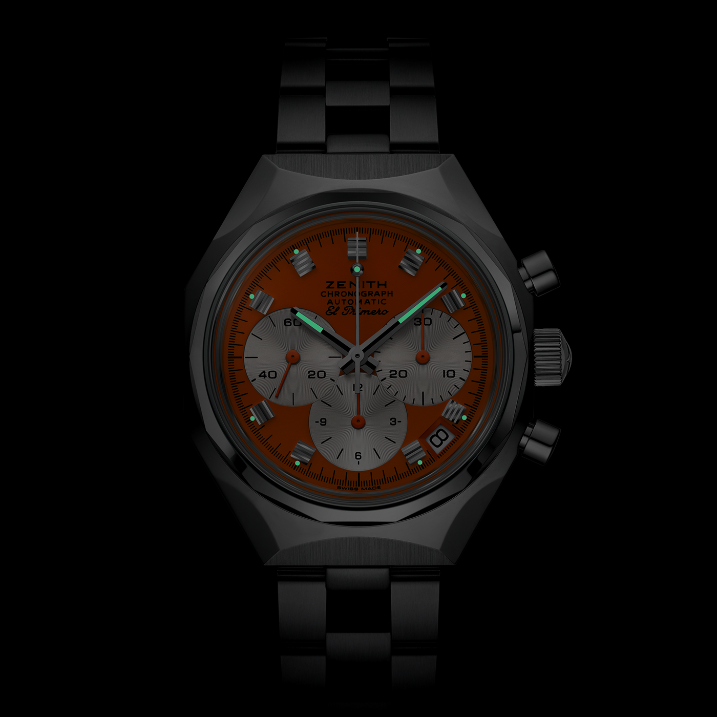 A close-up of the Zenith Defy Chronograph USM - Pure Orange wristwatch featuring an orange dial, three silver subdials, blue-tipped markers, and the "Zenith" logo—an example of Swiss precision and sophisticated style.