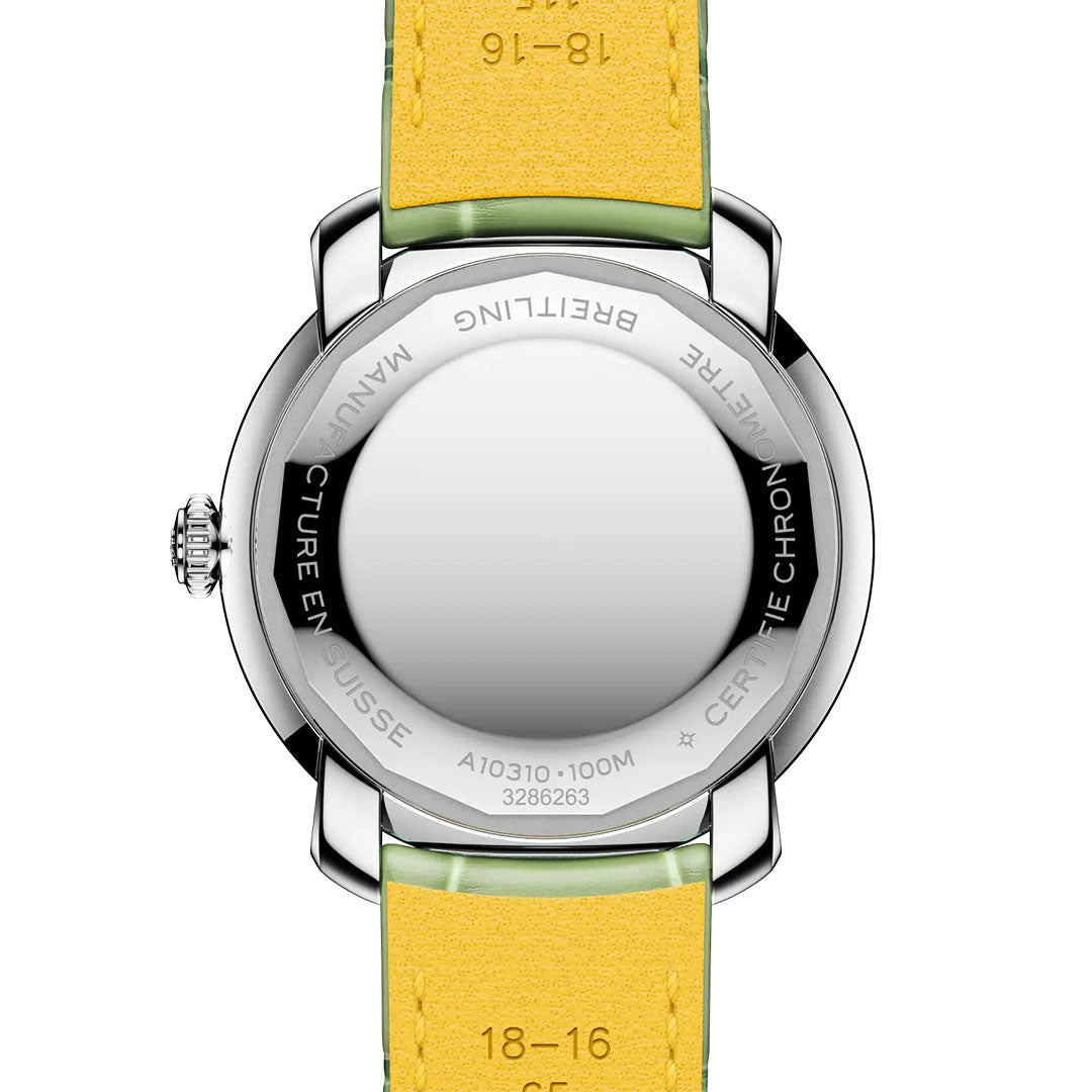 The back view of the BREITLING Lady Premier Automatic 36 shows a yellow leather strap, silver case with engraved “Breitling” and model details. The crown is visible on the left side of this women’s automatic watch.