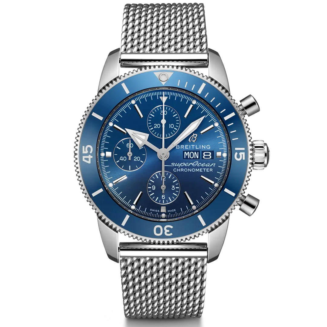 Discover the elegance of the BREITLING Superocean Heritage Chronograph 44. This diver's watch features a blue face, three subdials, day-date display, luminescent hands, mesh bracelet, and rotating bezel in silver stainless steel, reflecting the essence of Breitling’s renowned series.