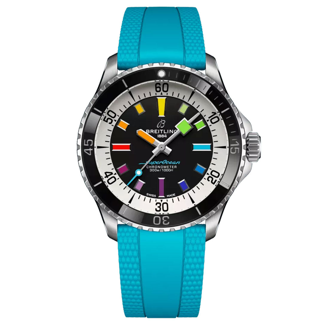 The BREITLING Superocean Automatic 42 showcases a black dial with vibrant hour markers, a stainless steel bezel, and glowing indexes. This ideal dive watch includes a striking silver crown and an eye-catching turquoise rubber strap. The face boldly features the "Breitling 1884 Superocean Chronometer" designation.