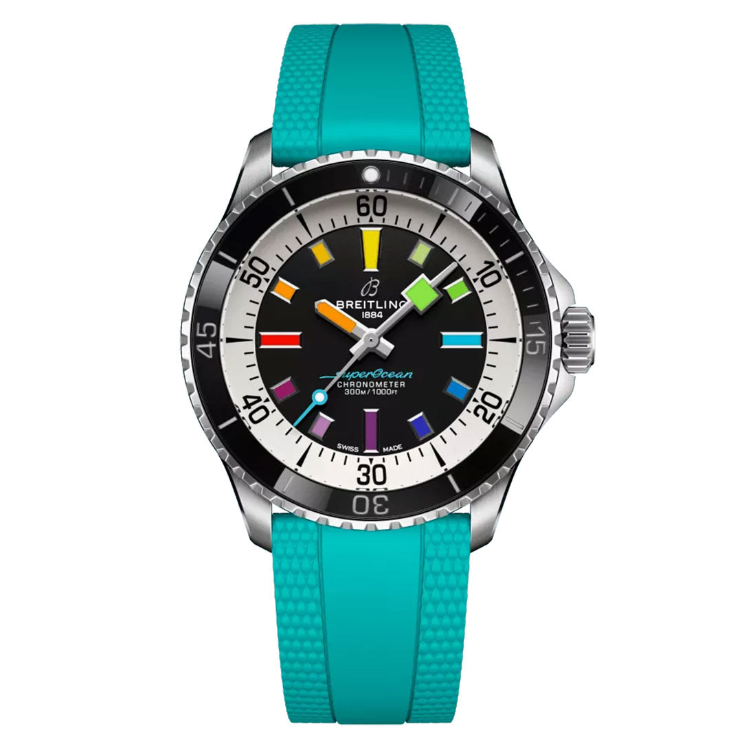 The BREITLING Superocean Automatic 42 features a turquoise rubber strap and a black dial adorned with colorful luminescent indexes. Silver indices enhance the design, alongside a scratch-proof ceramic bezel, while the logo and "Superocean Chronometer" inscription add distinctive flair to this elegant timepiece.