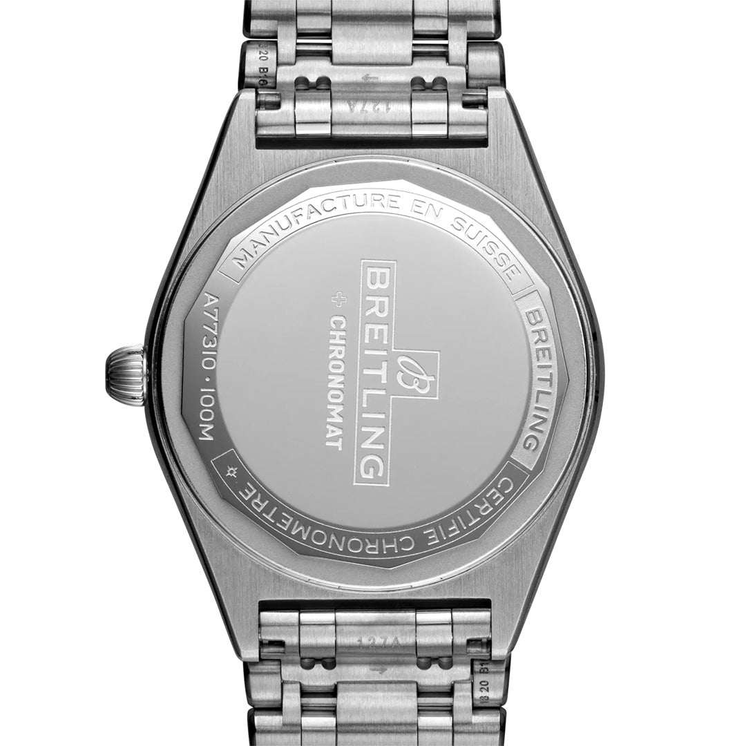 The image shows the back of the BREITLING Chronomat 32 by Breitling, with engravings including "MANUFACTURE EN SUISSE," "BREITLING," "CHRONOMAT," "CERTIFIE CHRONOMETRE," and water resistance details.