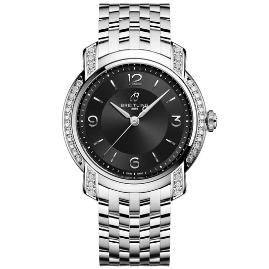 The BREITLING Lady Premier 32 is a silver women’s watch by Breitling featuring a black dial, silver hour markers, diamond-accented case, and polished metal link bracelet—an elegant timepiece.