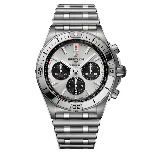 The Breitling Chronomat B01 42 is a striking stainless steel mechanical chronograph that showcases a silver dial accompanied by three black sub-dials, a date window, and a tachymeter scale. Equipped with the Breitling Manufacture Caliber 01, it features a red-tipped second hand and an intricately designed link bracelet. Its bezel is numbered for enhanced precision.