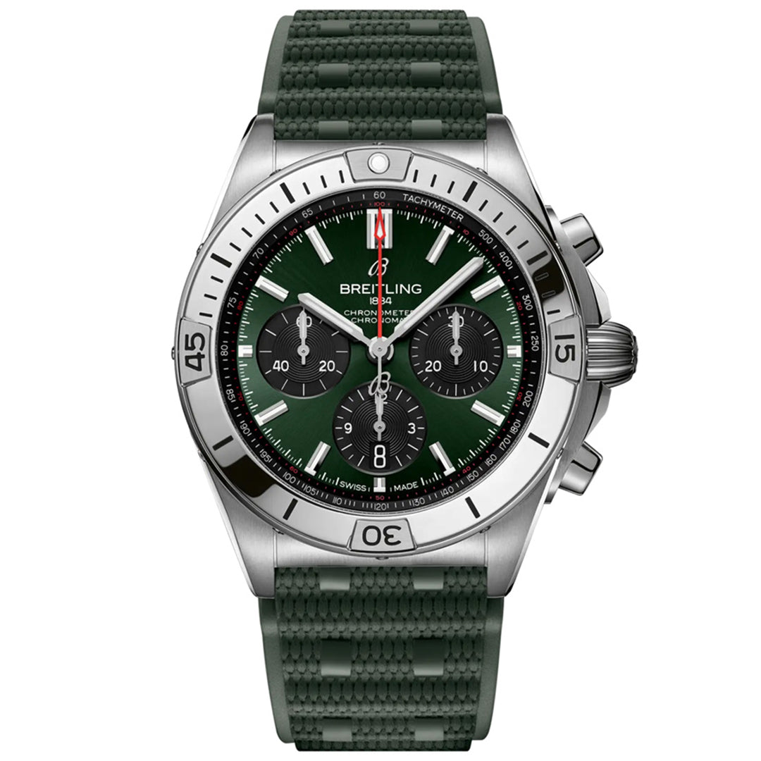 The BREITLING Chronomat B01 42, a silver watch with a dark green dial and strap, boasts a mechanical chronograph with three subdials, tachymeter bezel, and luminescent hands. Powered by Breitling Manufacture Caliber 01, its textured strap enhances elegance.