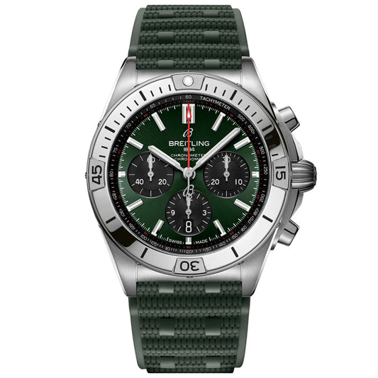 The BREITLING Chronomat B01 42, a silver watch with a dark green dial and strap, boasts a mechanical chronograph with three subdials, tachymeter bezel, and luminescent hands. Powered by Breitling Manufacture Caliber 01, its textured strap enhances elegance.