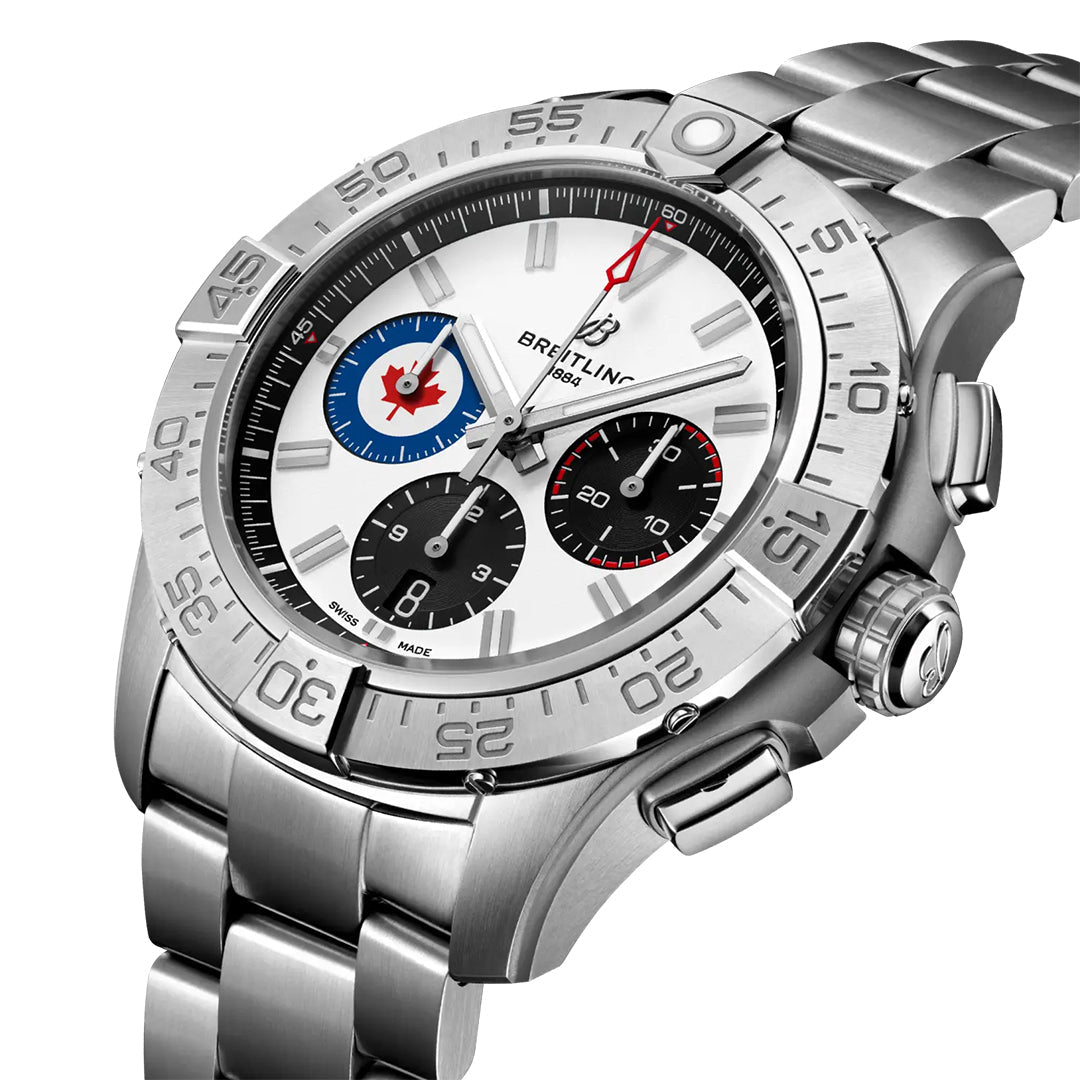 This limited edition Breitling Avenger B01 Chronograph 44 features a stainless steel band, white dial, two black subdials, and a red-tipped second hand. It honors the Royal Canadian Air Force with a blue and white logo detail, with an engraved numbered bezel finishing the design.