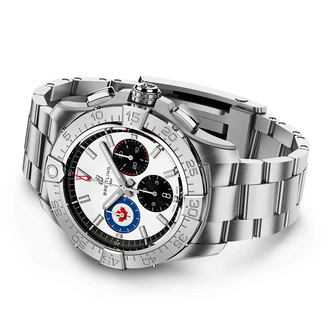 The BREITLING Avenger B01 Chronograph 44 Royal Canadian Air Force features a sleek steel design, white face with three black subdials, silver-tone indices, numerically marked bezel, and a metal band. It includes a subdial with a red and blue emblem honoring the RCAF.