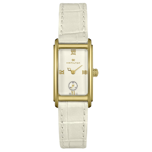 The Hamilton American Classic Ardmore Quartz 18.7mm X 27mm Watch by Hamilton Watch features a gold-toned rectangular case in an art-deco style, paired with an alligator-imitation leather strap. It has a white dial adorned with Roman numerals at 12, 3, 6, and 9 o'clock and includes a small sub-dial above the 6 o'clock position with refined gold hands and markers.