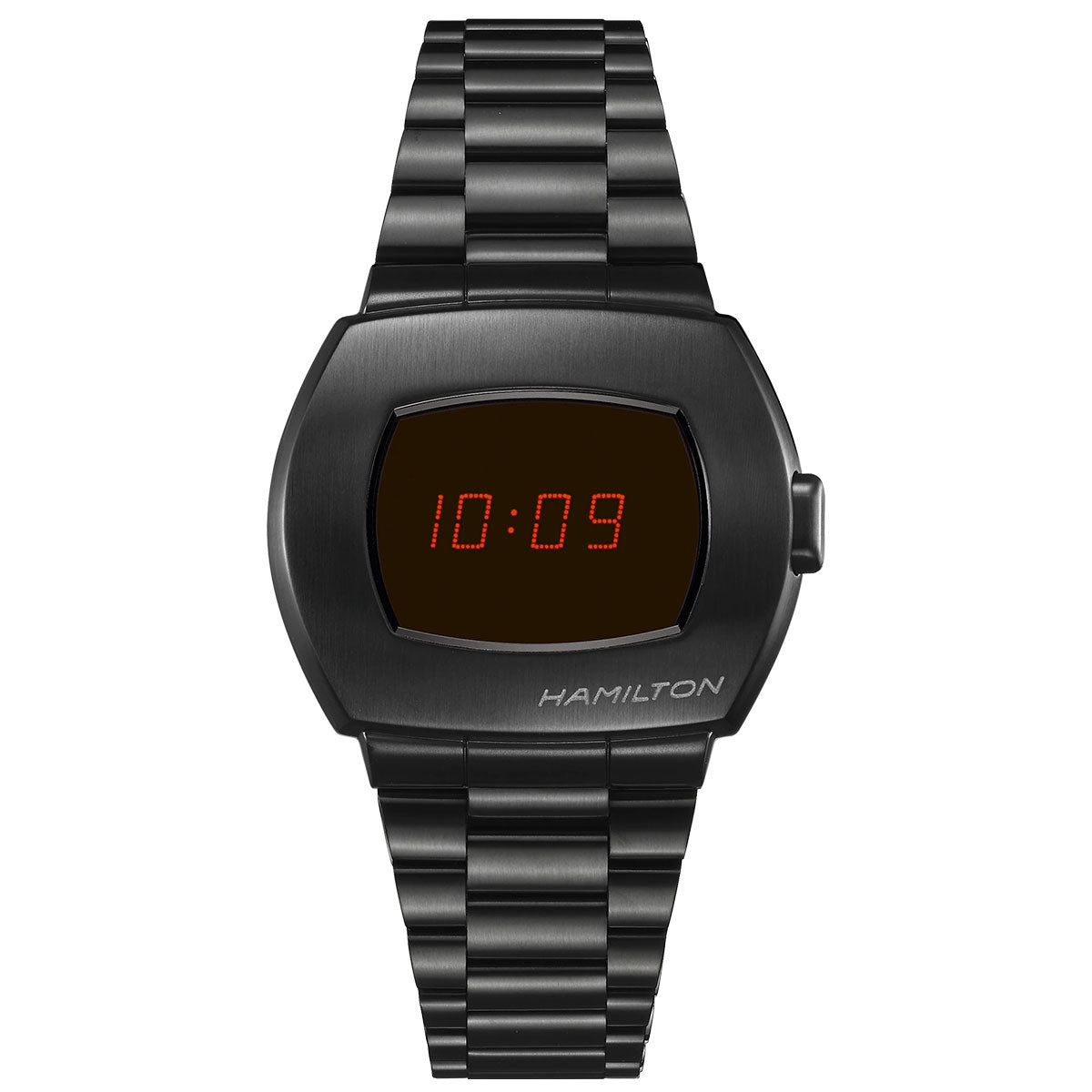 The Hamilton American Classic PSR Digital Quartz Watch by Hamilton Watch boasts a sleek rectangular face, black digital wristwatch design, and a stylish metallic band. It uniquely displays the time as 10:09 in vivid red LED numbers on its cutting-edge hybrid LCD and OLED screen.