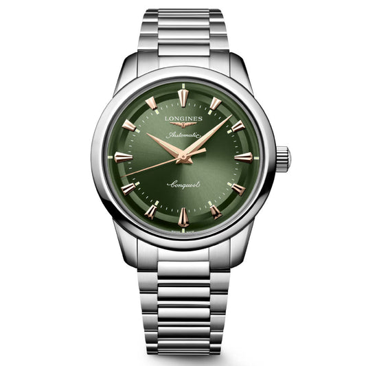 The Longines Conquest Heritage Automatic 40mm Watch features a silver metal case, green dial with gold hour markers and hands, "Longines" at the top, and a classic metal link bracelet for a timeless vintage look.