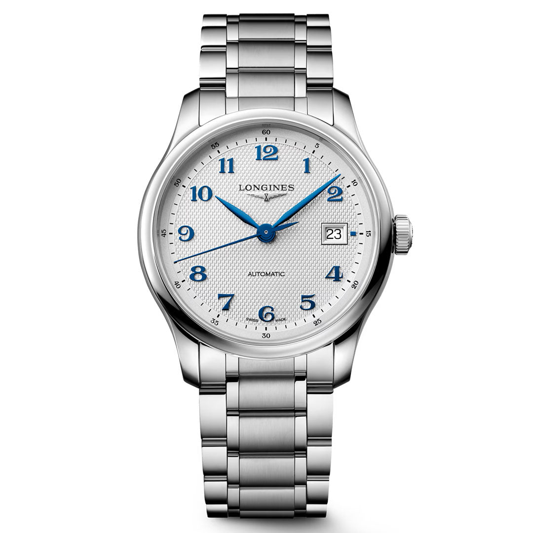 The Longines Master Collection Automatic 39mm Watch by Longines features a silver stainless steel bracelet, a white textured dial with blue Arabic numerals and hands, a date window at the 3 o’clock position, and “Automatic” displayed on the face—showcasing the precision of Swiss watchmaking.