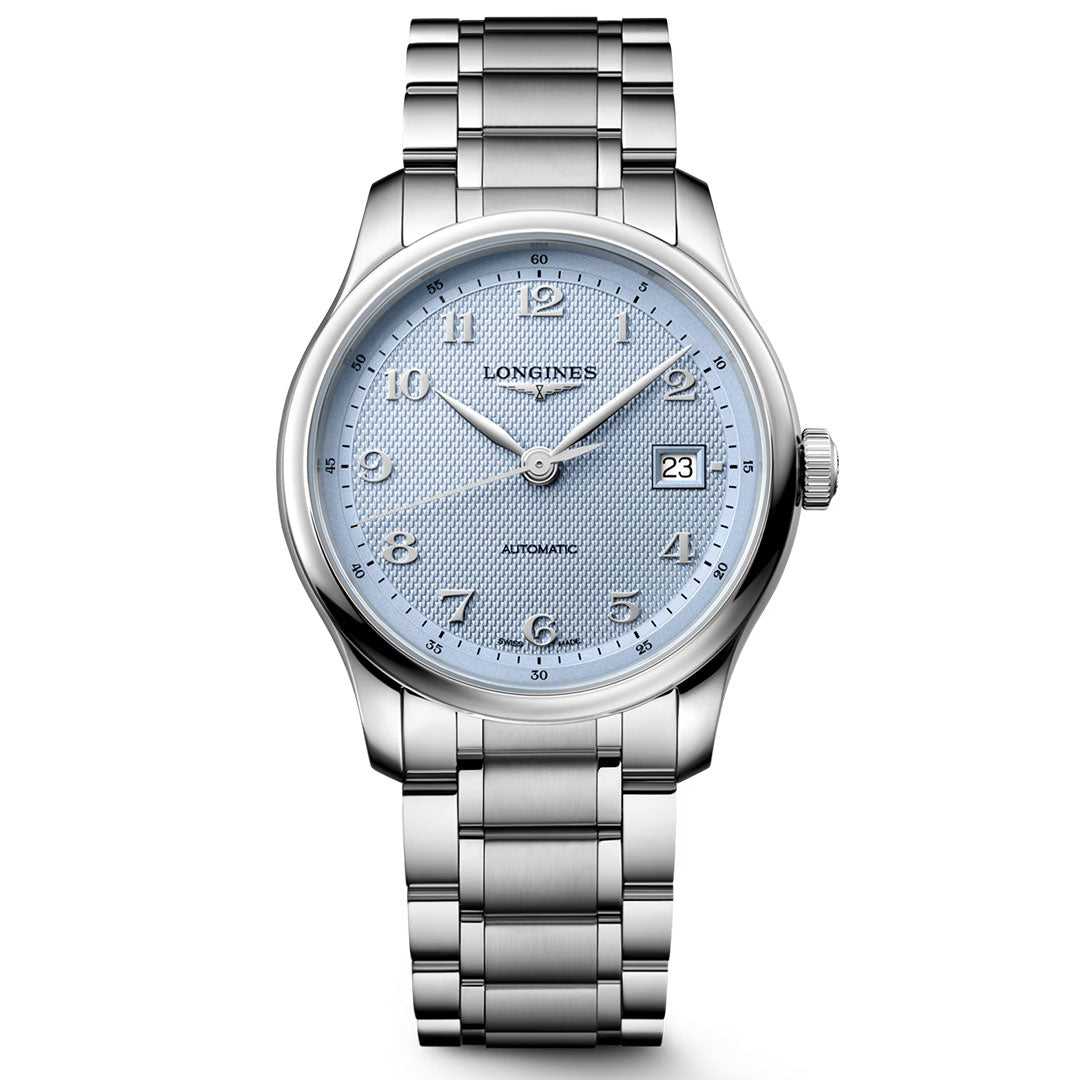 The Longines Master Collection Automatic 39mm Watch by Longines features a silver case, a light blue textured dial with silver hour markers, a date display at 3 o’clock, and a metal link bracelet; this luxury wristwatch is photographed on a white background.