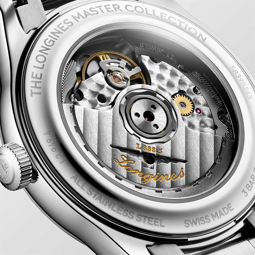 Close-up of the back of the Longines Master Collection Automatic 39mm Watch, showcasing the intricate mechanical movement and finely engraved details on the stainless steel case by Longines.