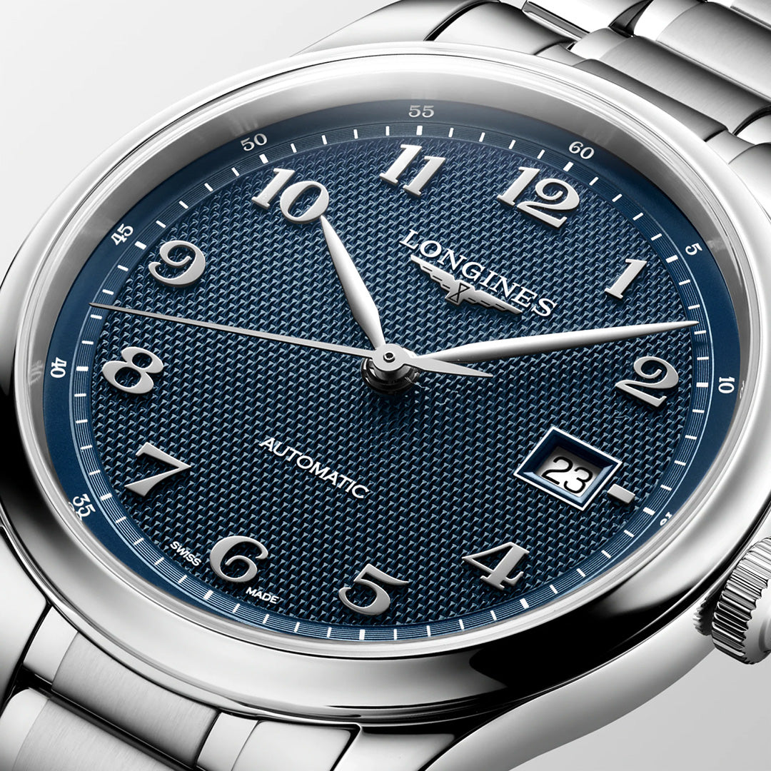 Longines Master Collection Automatic 41mm Watch with a textured blue dial, Arabic numeral hour markers, and a date window at the three o’clock position.