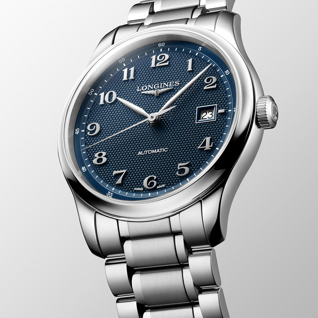 Longines Master Collection Automatic 41mm Watch featuring a blue textured dial, silver Arabic numerals, a date window at three o’clock, and a stainless steel link bracelet.