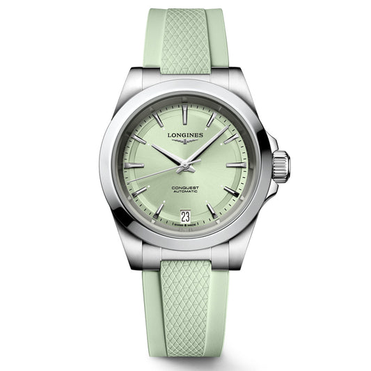 The Longines Conquest Automatic 34mm Watch exemplifies horological excellence with its pale green dial and matching rubber strap. It is adorned with a stainless steel bezel, silver hour markers, and a date display at the 6 o'clock position, encapsulating refined craftsmanship.