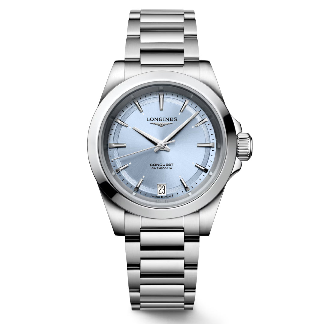 This sporty yet elegant wristwatch from the Longines Conquest collection features a light blue dial with a date window. Silver hour markers and hands accentuate its metallic linked strap, while "Longines" proudly adorns the dial.