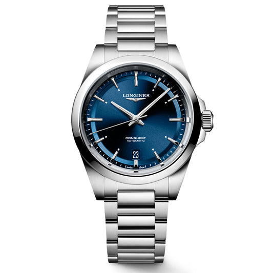 The Longines Conquest Automatic 38mm Watch features a stainless steel case and bracelet, blue gradient dial with silver hour markers and hands, date at 6 o’clock, plus the Longines logo and "Conquest Automatic" on the face.
