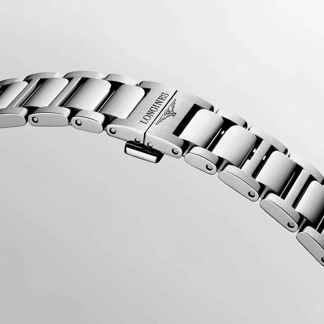 Close-up of a stainless steel bracelet from the Longines Conquest Quartz 38mm Watch, featuring the engraved "LONGINES" name and winged hourglass logo on the clasp, set against a plain light background—a refined, everyday option among luxury watches.