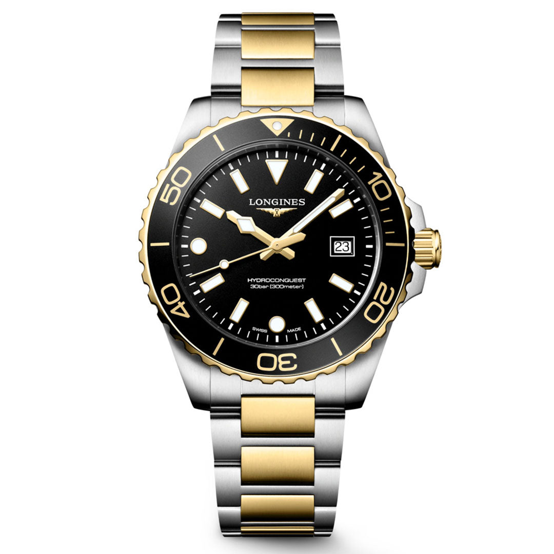 Introducing the Longines HydroConquest Quartz 42mm Watch—a distinguished creation from Longines. This model showcases a striking black and gold bezel, a black dial enhanced by gold-accented hands, a date window at the 3 o’clock position, and a sophisticated two-tone silver and gold metal bracelet. Exemplifying the excellence of Swiss watchmaking, it is an ideal choice for those who value refined sport watches.