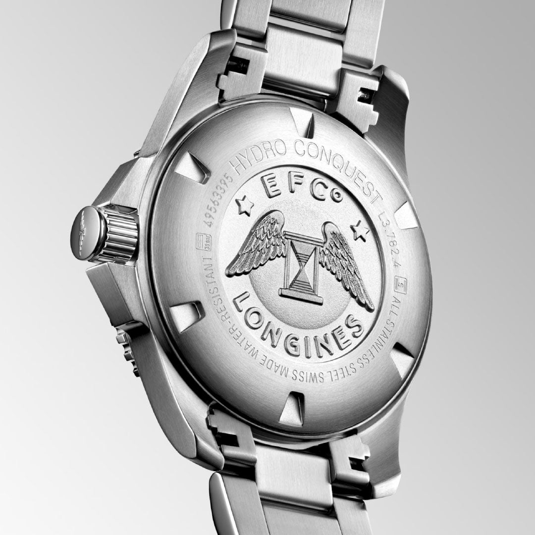 Close-up of the back of the Longines HydroConquest Automatic 43mm Watch, showcasing engraved text, stars, and the signature winged hourglass logo on its stainless steel caseback.
