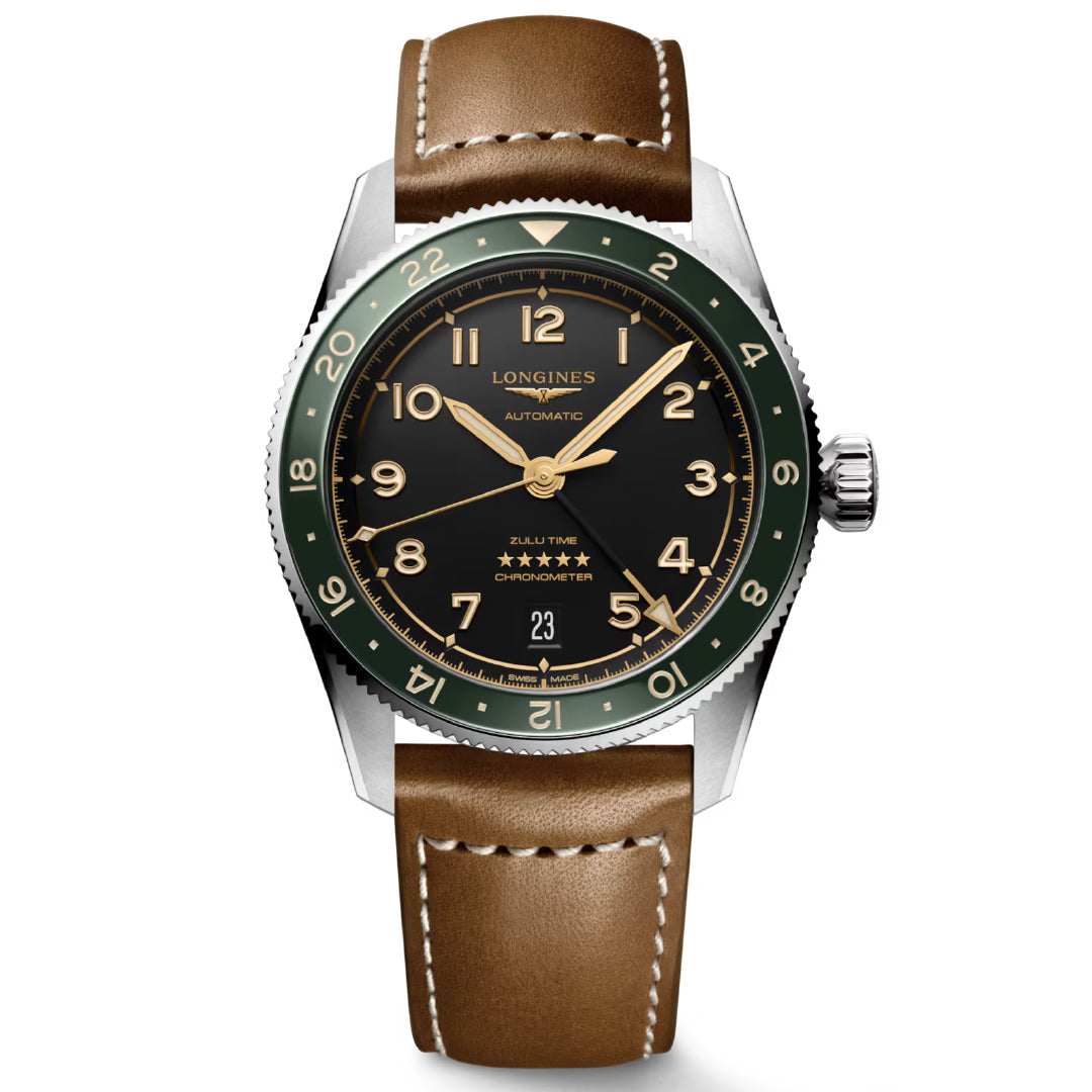 The Longines Spirit Zulu Time Automatic 39mm Watch features a round black and green dial with ceramic insert accents, brown leather strap, Arabic numerals, luminous hands, and a date window at 6 o'clock, blending elegance with functionality.