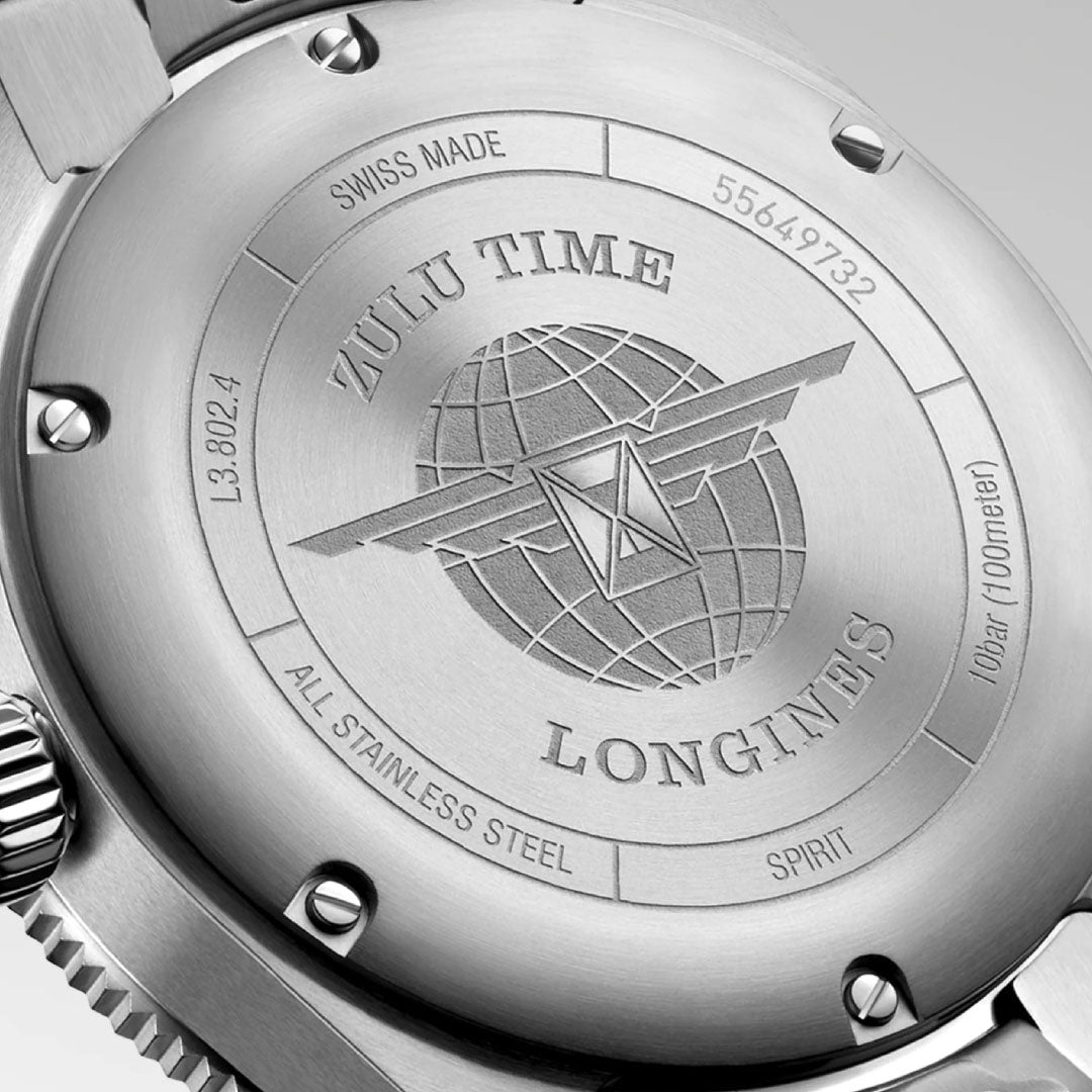 Close-up of the Longines Spirit Zulu Time Automatic 39mm Watch back, featuring engraved text, the globe with wings logo, and details like "SWISS MADE," "10 bar (100 meter)," and "ALL STAINLESS STEEL.