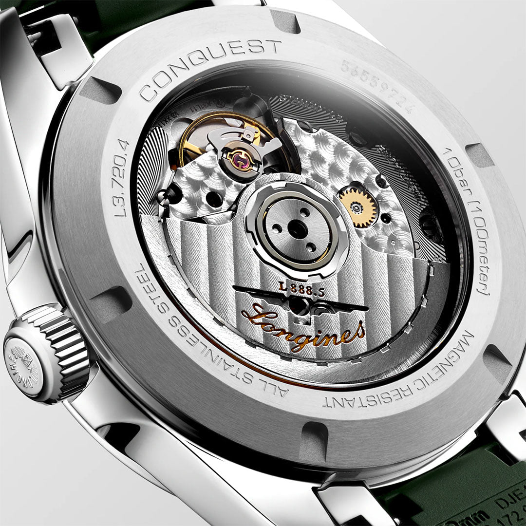 Close-up of the Longines Conquest Automatic 38mm Watch, highlighting its detailed automatic movement and engraved "CONQUEST" on the all stainless steel case—an ideal everyday timepiece from Longines.