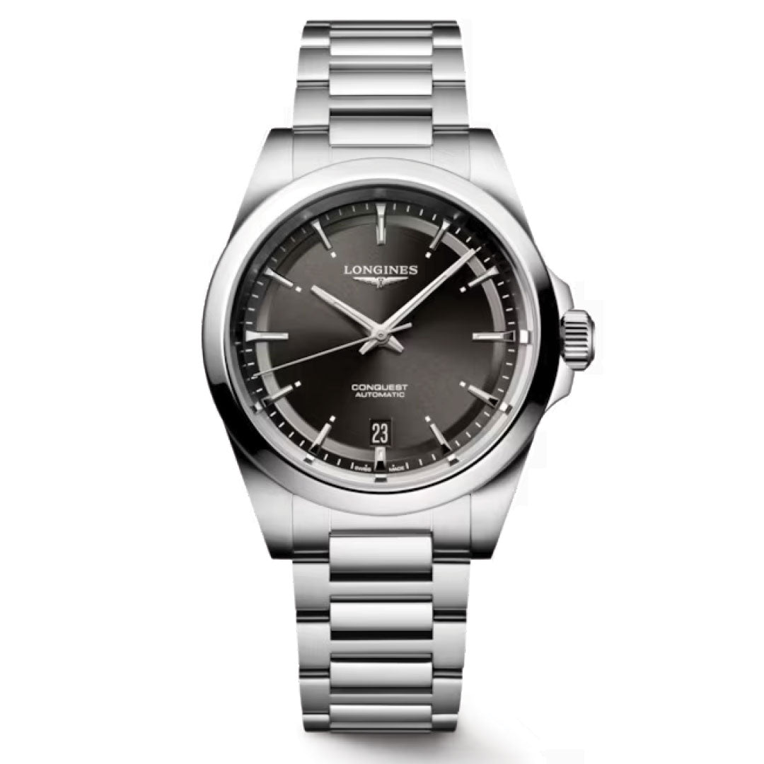 The Longines Conquest Automatic 38mm Watch features a stainless steel case, dark gray round dial, silver markers and hands, date display at 6 o’clock, and a brushed metal bracelet—an ideal everyday timepiece from Longines.